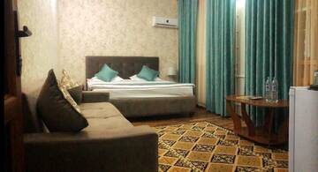 Улучшенный четырехместный номер в Отеле Rich Hotel